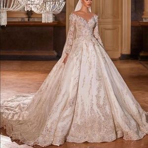 wedding dress trnsformer,Italian brand Mila Nova.dress size xs , color ivari.